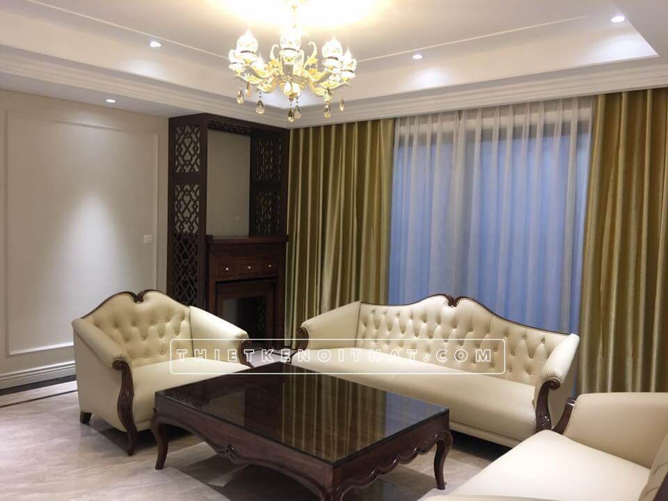 Bàn thờ tủ 2 tầng có ngăn kéo được đặt trong khu vực trang nghiêm nhất trong phòng khách Thi công nội thất phòng khách đẹp, sang trọng