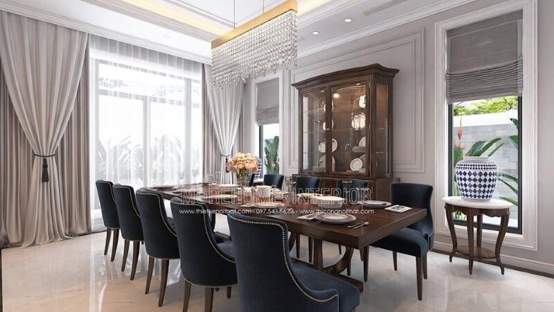 Trang trí nội thất phòng ăn gỗ óc chó tân cổ điển đẹp, sang trọng từ bàn gỗ nguyên khối, ghế bọc nệm cao cấp, kệ, tủ kệ trang trí.